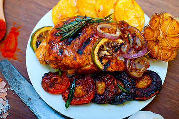 Image showing roasted grilled BBQ chicken breast with herbs and spices