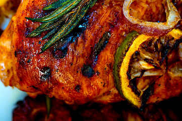 Image showing roasted grilled BBQ chicken breast with herbs and spices