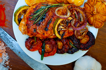 Image showing roasted grilled BBQ chicken breast with herbs and spices