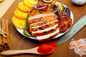 Image showing roasted grilled BBQ chicken breast with herbs and spices