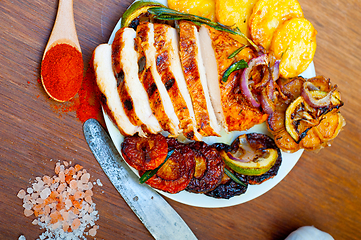 Image showing roasted grilled BBQ chicken breast with herbs and spices