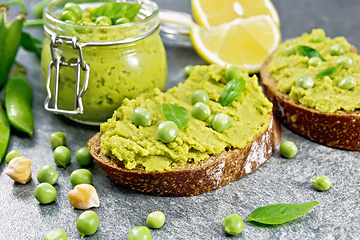 Image showing Sandwich green pea hummus on the table