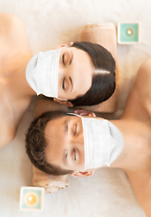 Image showing couple in masks at aromatherapy at spa session