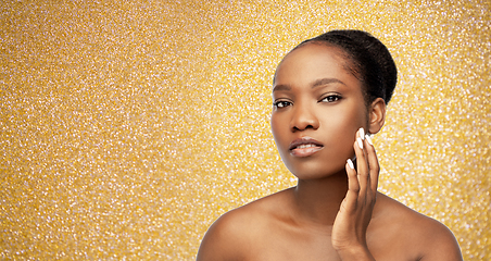 Image showing portrait of african woman touching her face