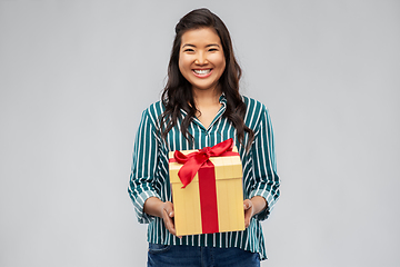 Image showing happy asian woman with birthday present