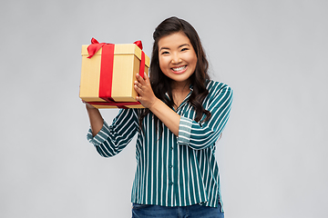 Image showing happy asian woman with birthday present