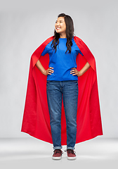 Image showing happy asian woman in red superhero cape