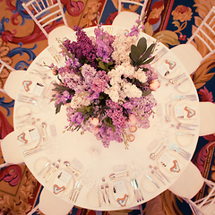 Image showing Festive table decoration in Lilac colours.