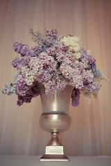 Image showing Lilac bouquet in a silver vase