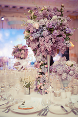 Image showing Festive table decoration in Lilac colours.