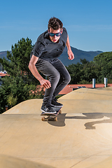 Image showing Skateboarder on a pump track park