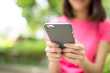 Image showing Woman use of cellphone at outdoor park