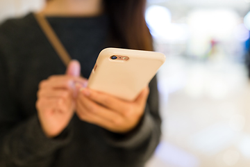 Image showing Woman working on smart phone