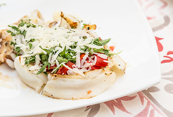 Image showing Cuttlefish with tomato, salad and Parmigiano cheese