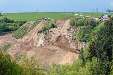 Image showing opencast mining quarry with machinery