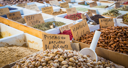 Image showing Traditional almonds and pistachios market in South Italy