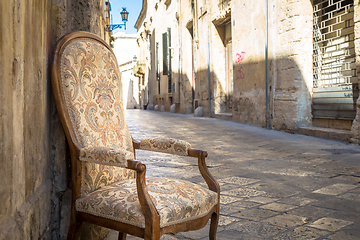 Image showing Old chair in a traditional street of Lecce, Italy.