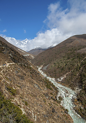 Image showing Lhotse summit, trail and river in the Himalayas