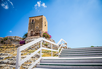 Image showing Sicily, Italy. Old house with purple flowers in Syracuse.