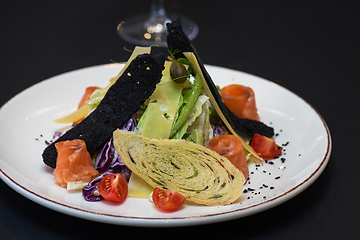 Image showing Caesar salad with salmon fish