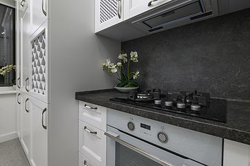 Image showing Luxury well designed modern black and white kitchen