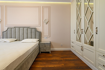 Image showing Beige and brown modern bedroom interior with double bed