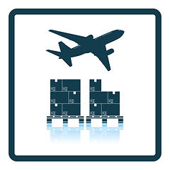 Image showing Boxes on pallet under airplane