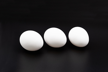 Image showing Eggs on black.