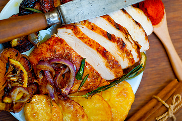 Image showing roasted grilled BBQ chicken breast with herbs and spices