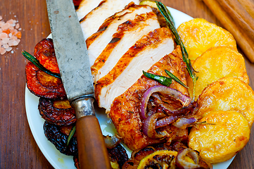 Image showing roasted grilled BBQ chicken breast with herbs and spices