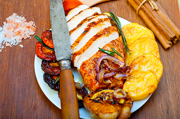 Image showing roasted grilled BBQ chicken breast with herbs and spices