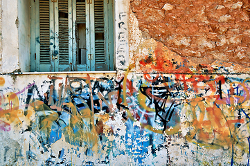 Image showing abandoned house wall with messy graffiti