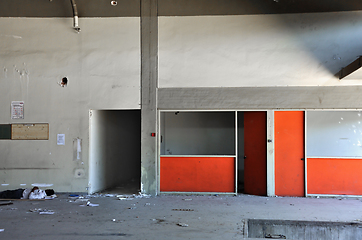 Image showing immigrant sleeping in abandoned factory