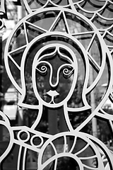Image showing saint on metal church door