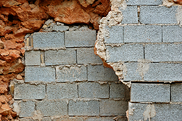 Image showing broken stone and cinder block walls