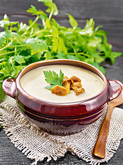 Image showing Soup puree of chanterelle in bowl on napkin