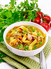 Image showing Soup with mung and noodles in bowl on towel