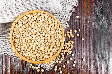 Image showing Soybeans in wicker bowl on board top