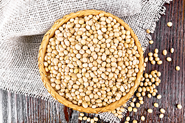 Image showing Soybeans in wicker bowl on dark board top