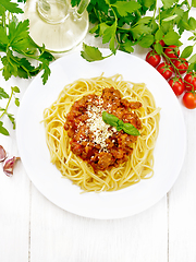 Image showing Spaghetti with bolognese on light board top