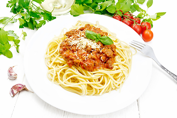 Image showing Spaghetti with bolognese on light board