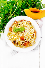 Image showing Spaghetti with pumpkin in plate on light board top