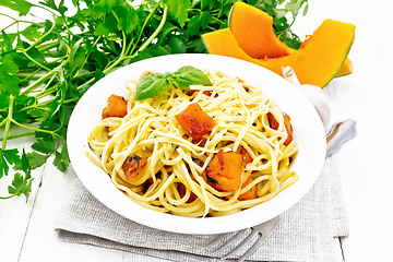 Image showing Spaghetti with pumpkin in plate on light board