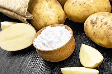 Image showing Starch potato in bowl on black board