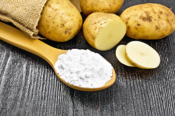 Image showing Starch potato in spoon on board