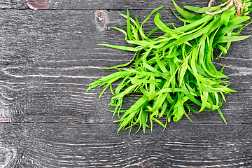 Image showing Tarragon bundle on board top