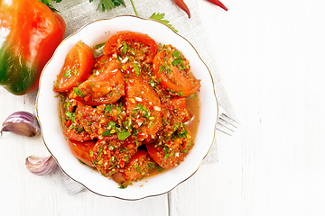 Image showing Tomatoes Korean in plate on board top