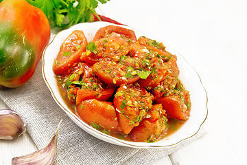 Image showing Tomatoes Korean in plate on board