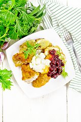 Image showing Turkey breast with cranberry sauce on light board top