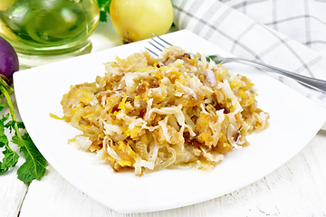 Image showing Turnip fried in plate on wooden board